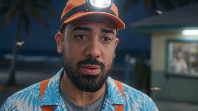 A prank streamer with a head torch at night